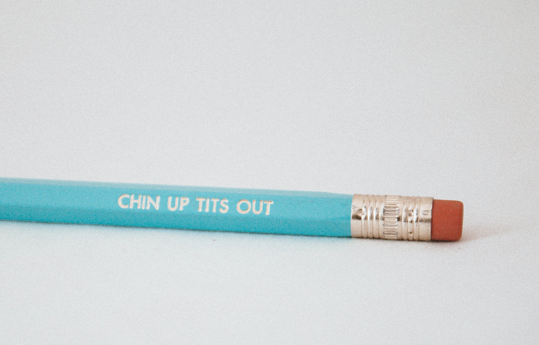 chin up, tits out pencil